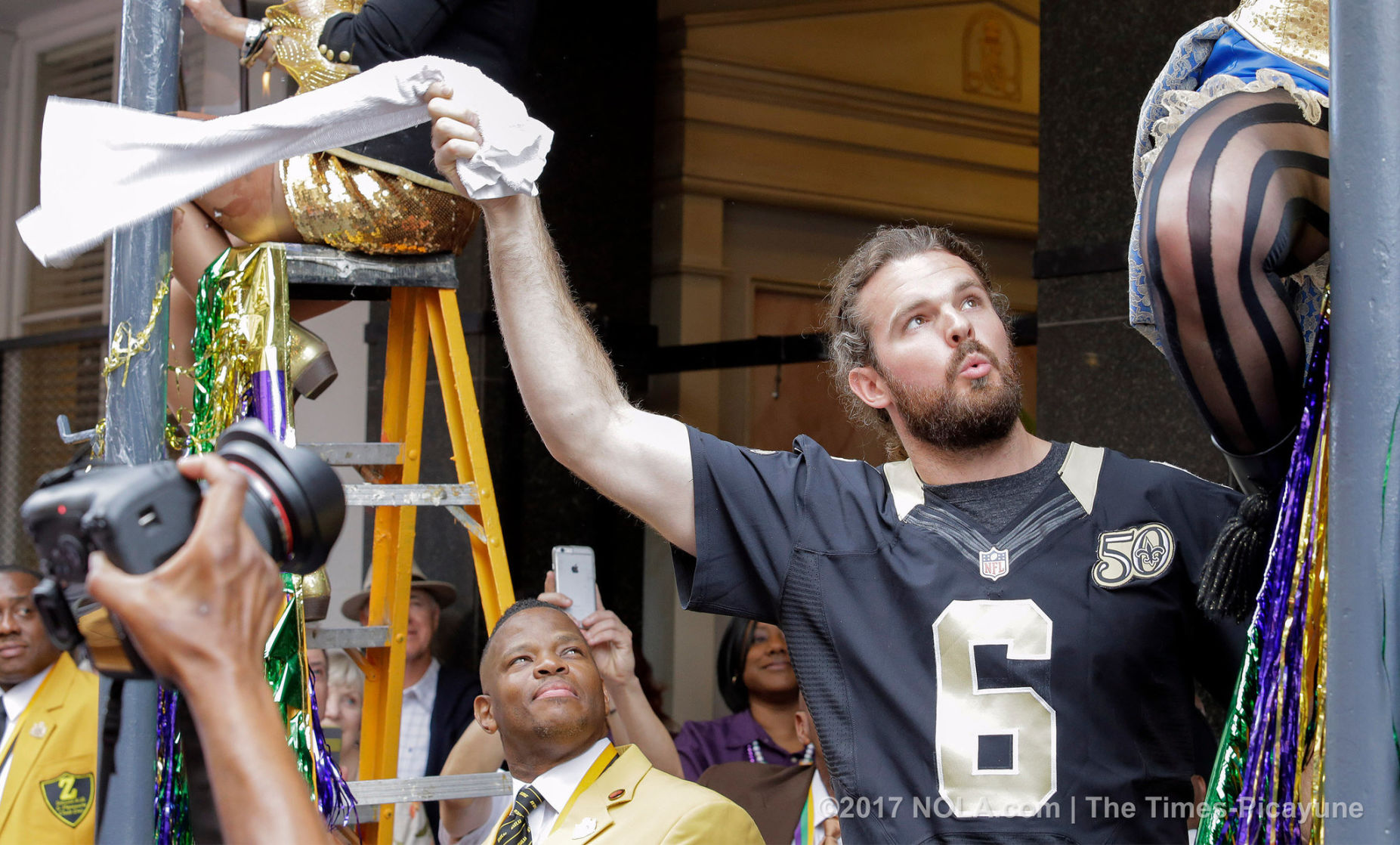 Only on Bourbon Street: Greasing of the Poles for Mardi Gras